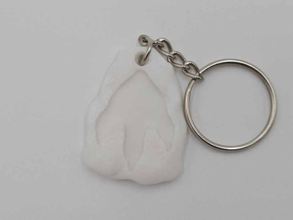 Ślad Giganta — breloczek skamieniałe odbicie stopy T-rex - Druk 3D