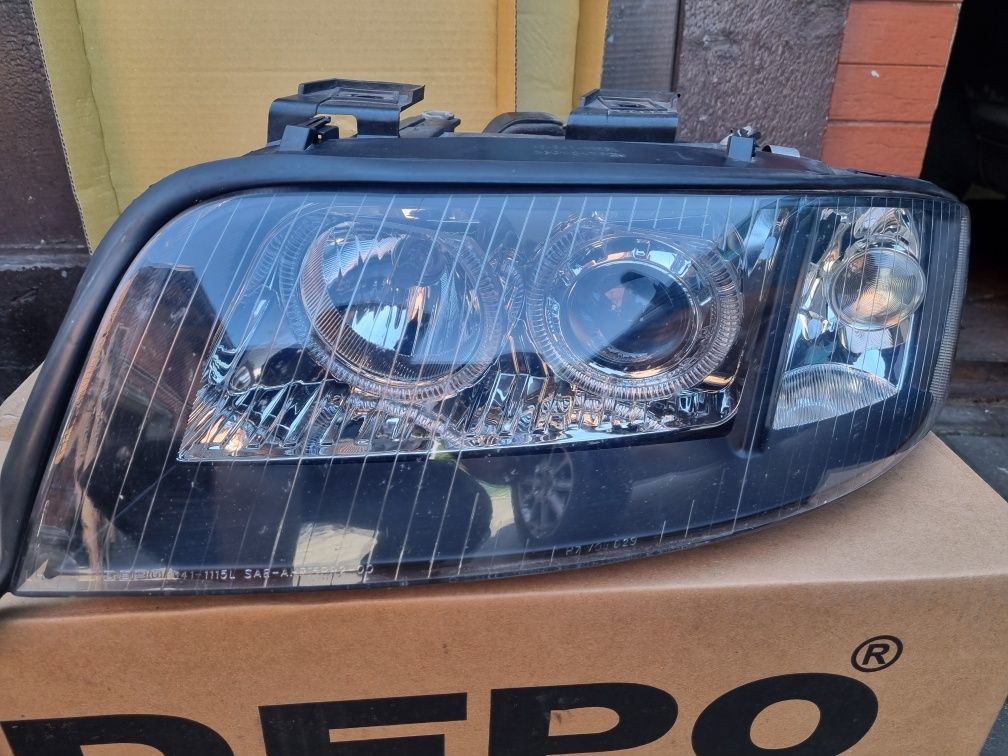 Lampy przód Audi A6C5 ringi xenon d2s Lift DEPO  polift angel eyes