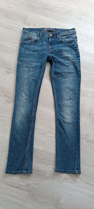 Spodnie jeansowe Bare Denim Division roz 32