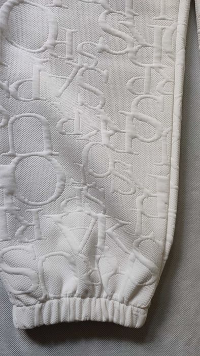 Spodnie dresowe damskie we wzory tłoczone litery plus size rozmiar XL