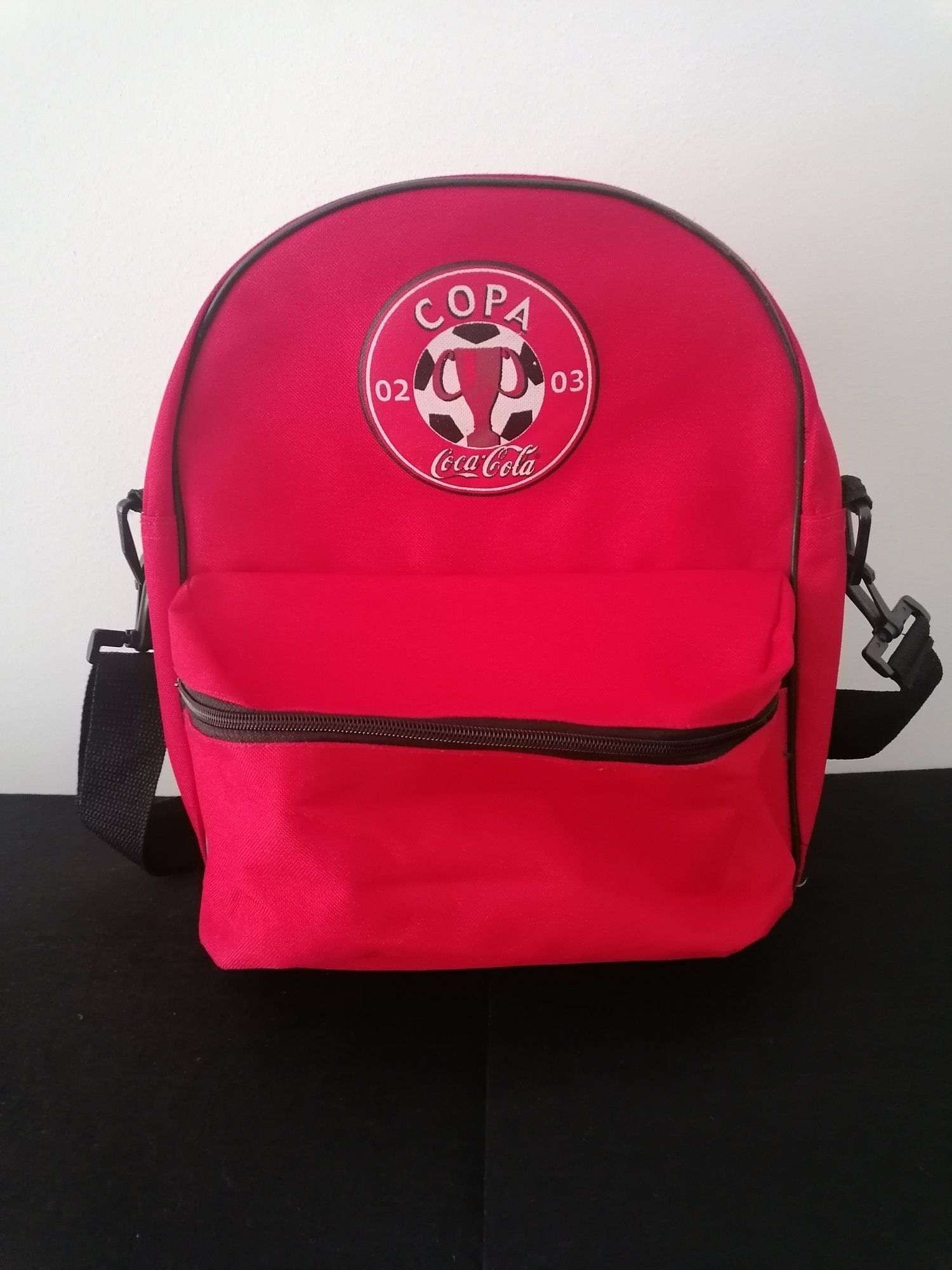 Mochila com publicidade da Coca-Cola aquando da Copa 2002 /2003.