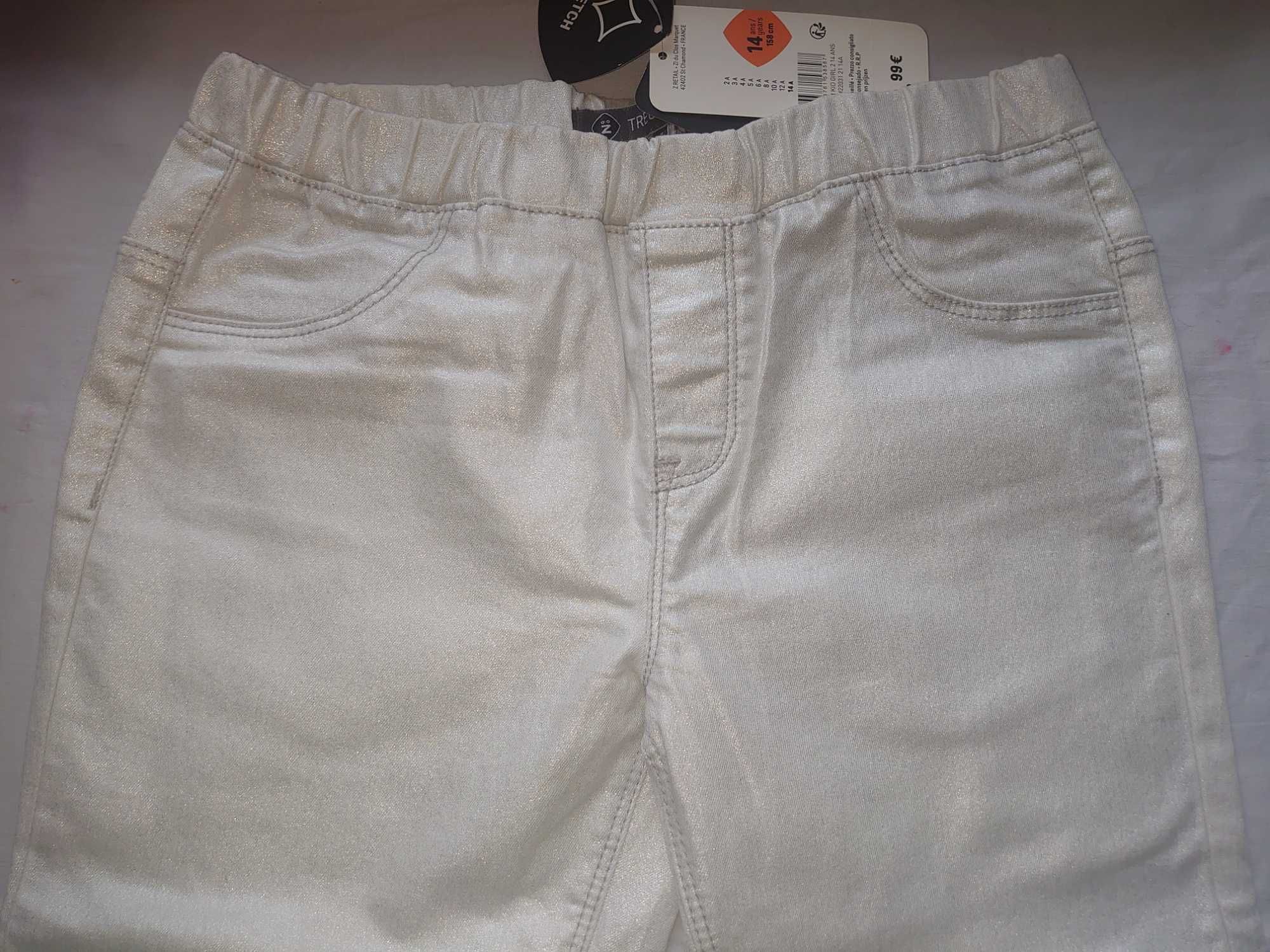 Spodnie srebrne z nicią brokatowa jasne roz 158 cm. 12-14 lat