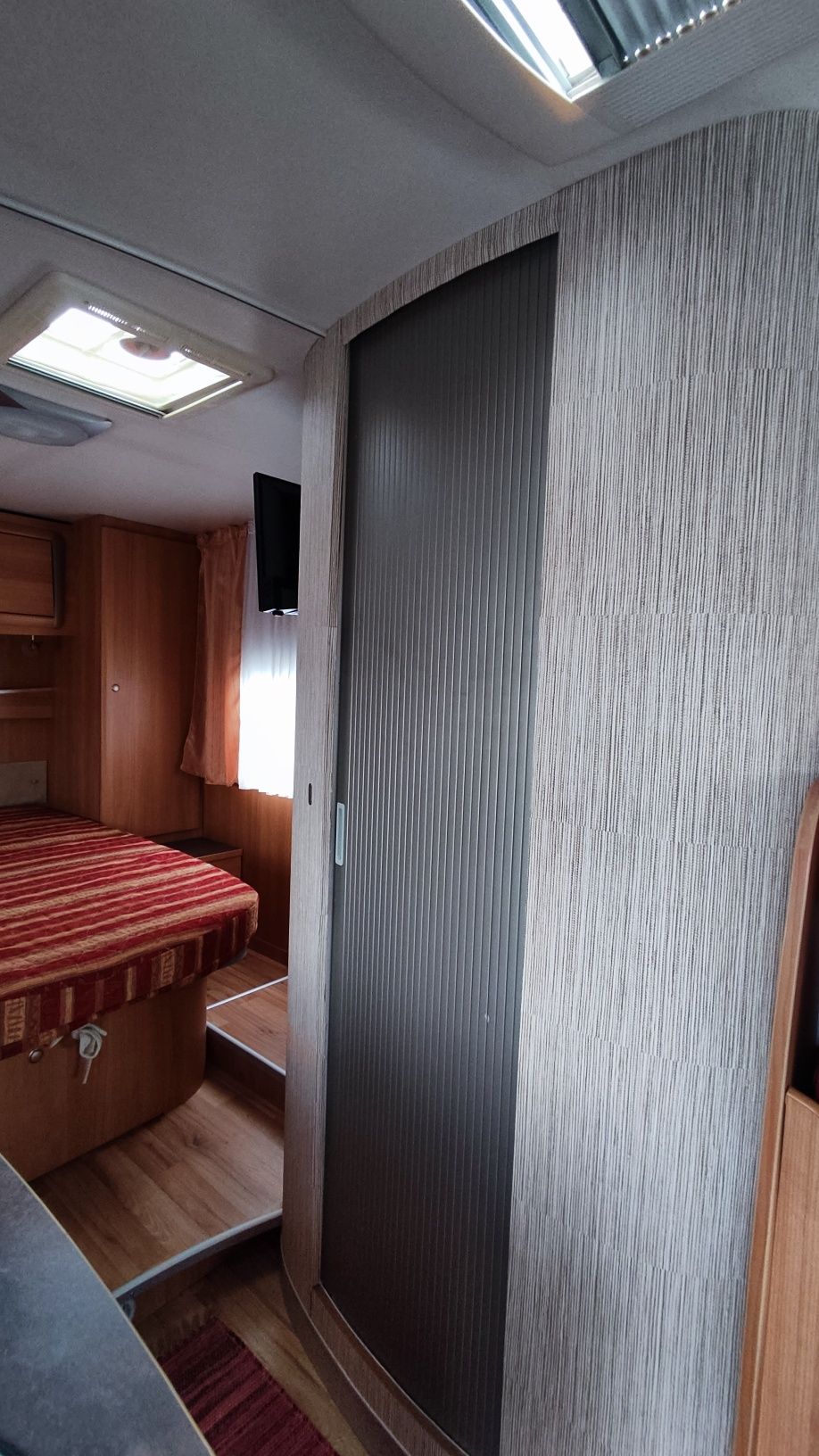 Autocaravana Cama central