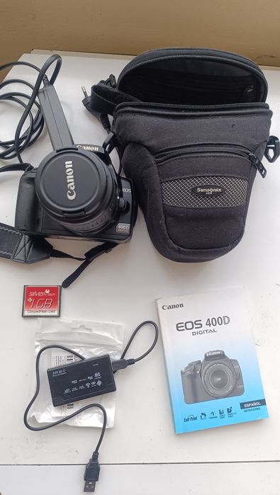 Canon 400D , lente, cartão de memoria, mala, manuais, a funcionar bem