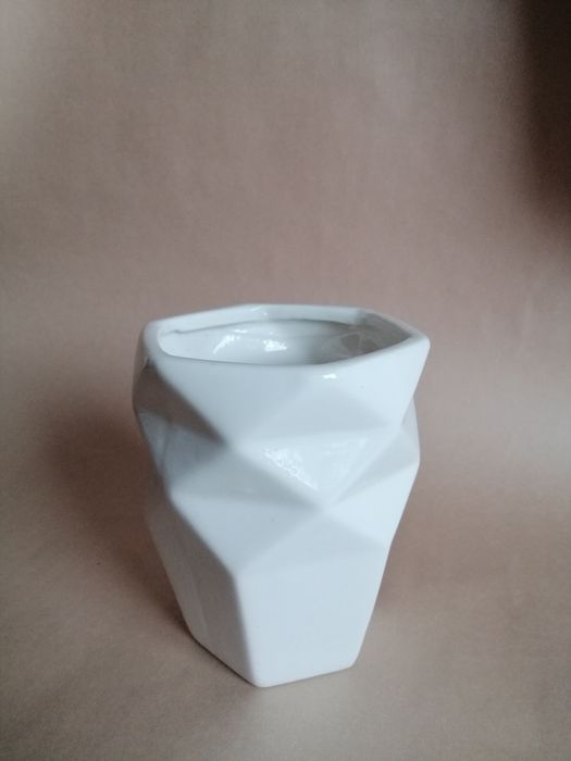 Geometryczna osłonka na kwiatka