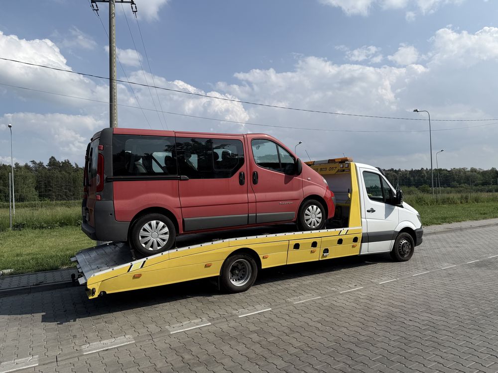 Pomoc drogowa, autolaweta, holowanie, transport aut wózków maszyn