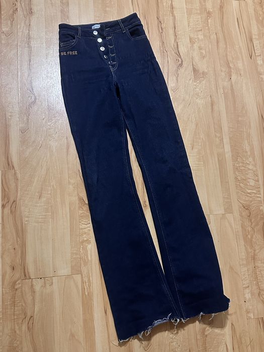 Джинси кльош в темно-синьому кольорі