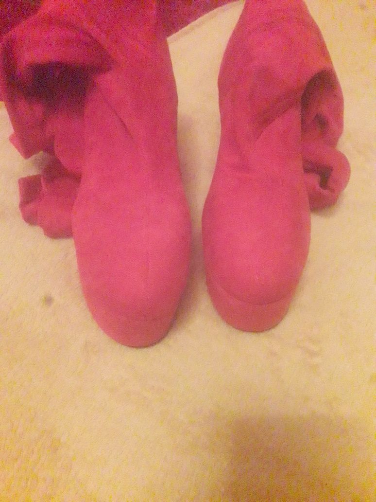 Botas  altas acima joelho