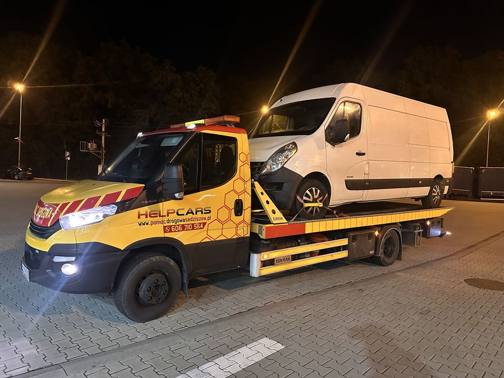 Pomoc drogowa holowanie transport maszyn przyczepa laweta autolaweta