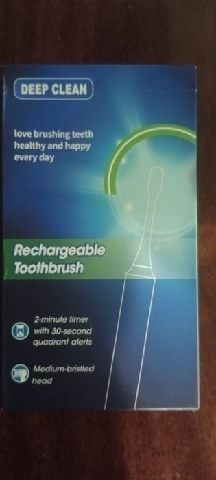 Электрическая зубная щётка