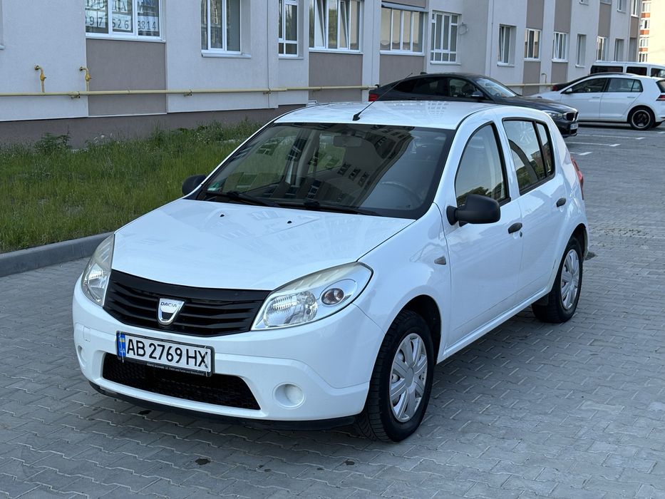 Сандеро 1.4 газ бензин