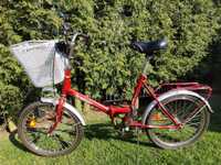 Czerwony rower typu składak