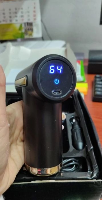 Pistola de massagens