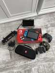 Nintendo switch + 4 gry + 2 pady + etui