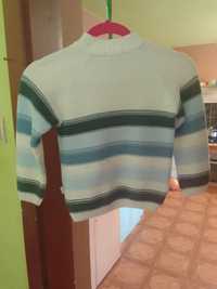 Sprzedam za dbany sweterek dla chłopca rozmiar 120