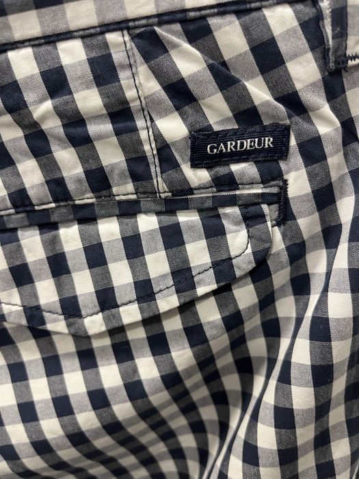 Чоловічі штани в клітинку