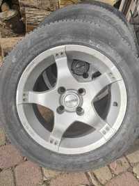 Koła z alufelgami po Peugeot 206. (185/65 R15.)