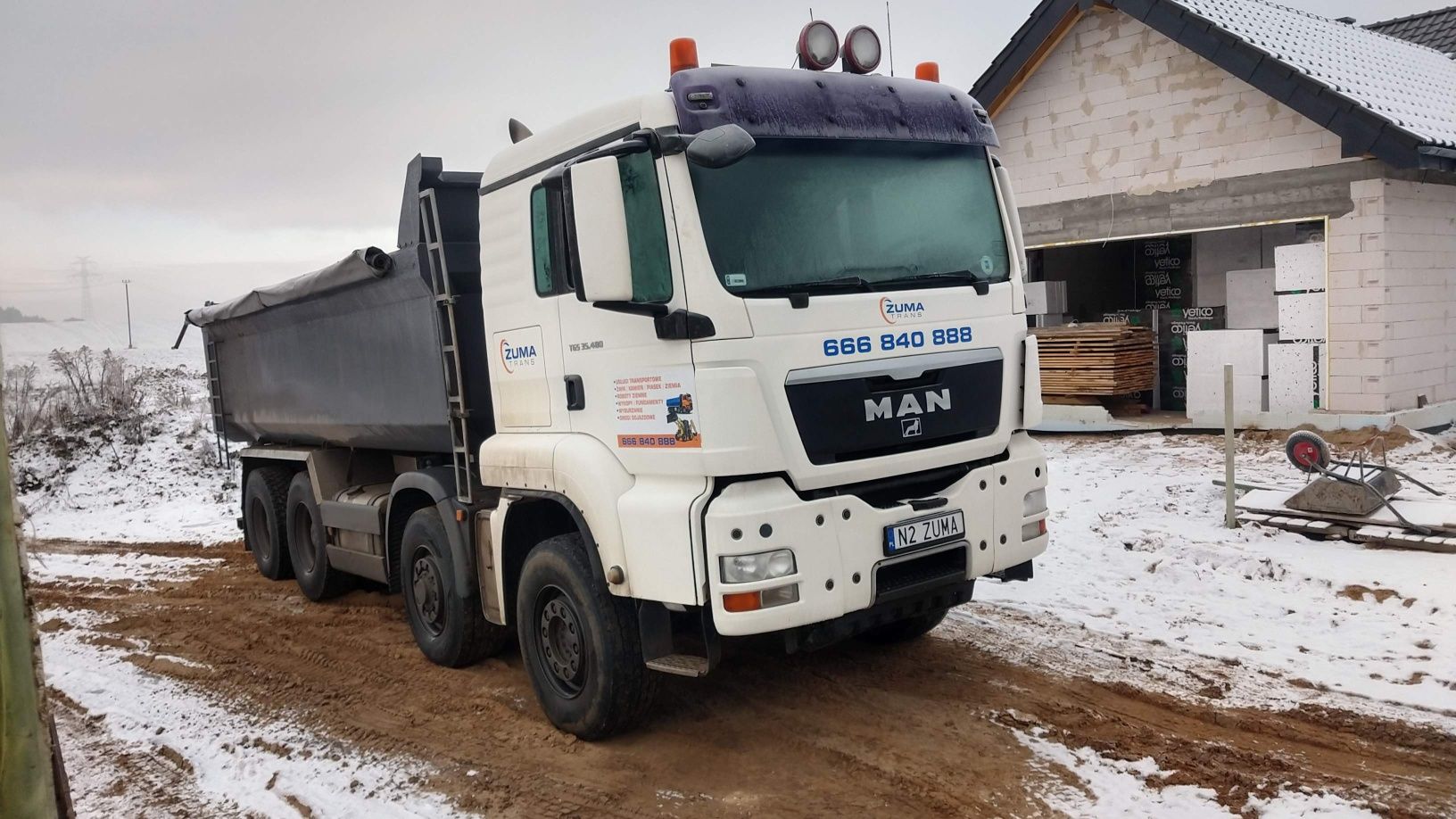 Usługi koparkoładowarką Transport