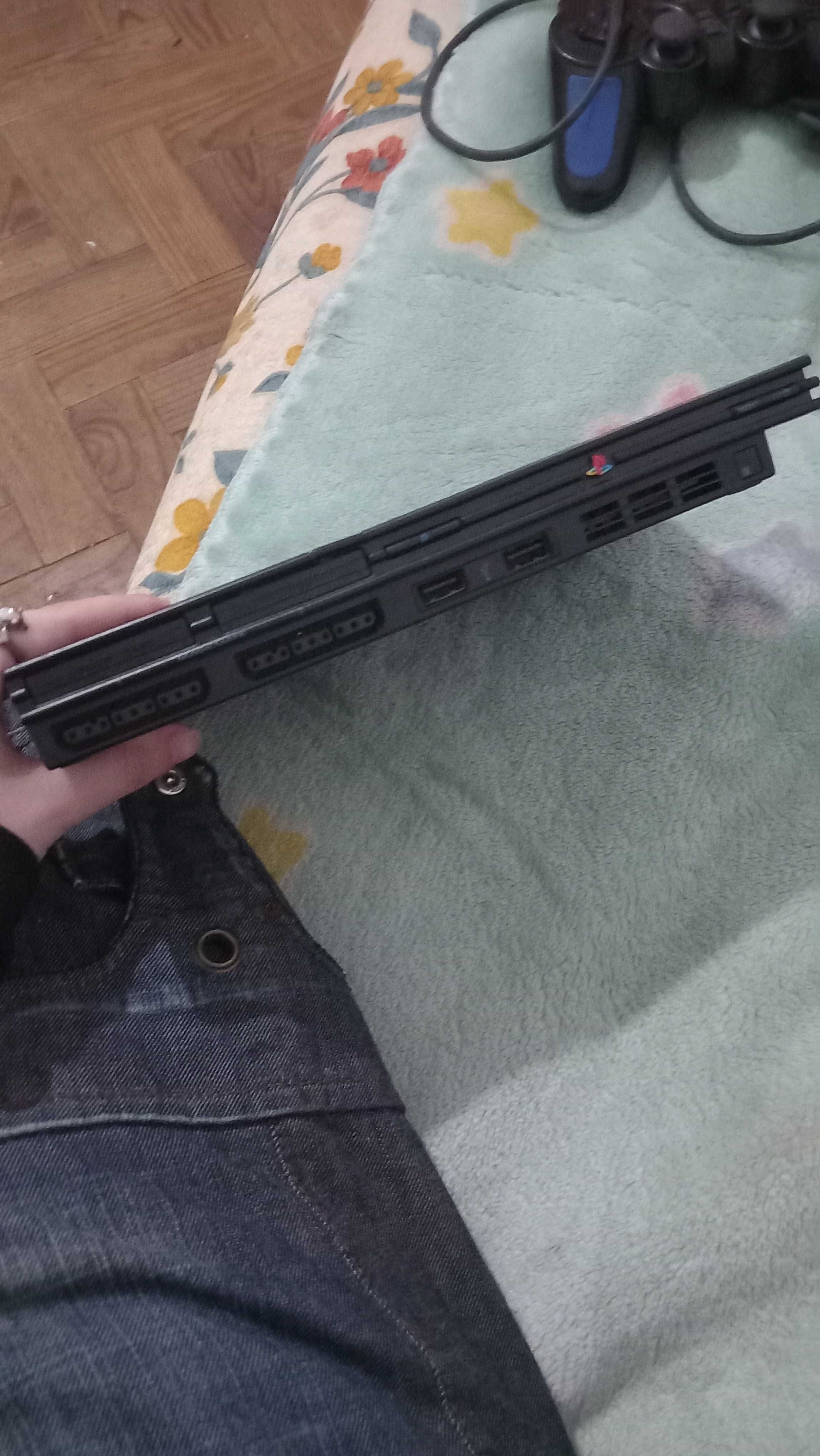 Vendo Ps2 Slim com comando paralelo