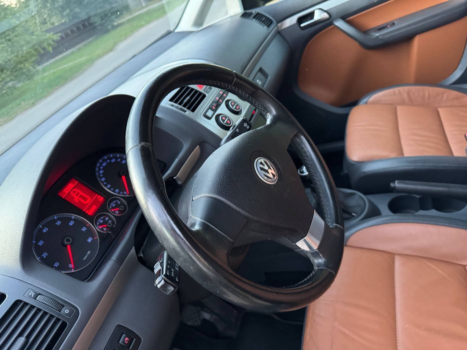 Фольксваген тоуран