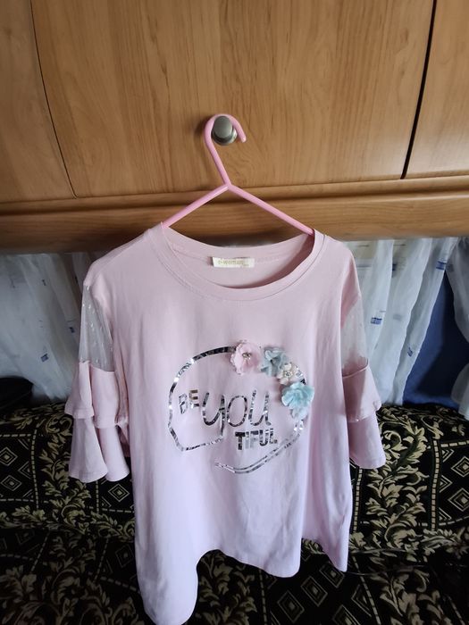 Camisola rosa de mulher