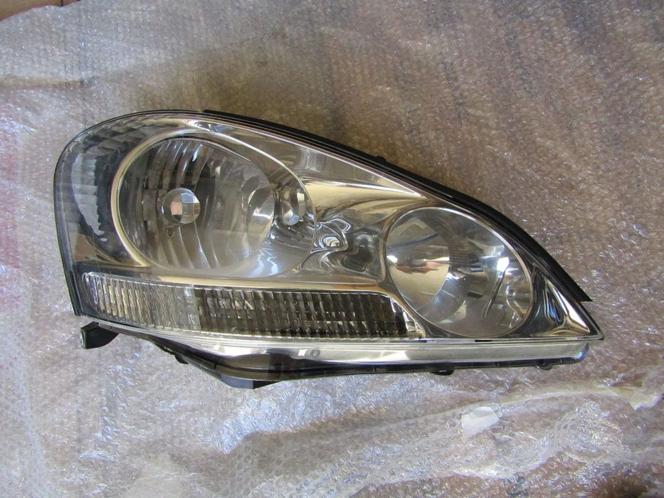 Farol direito Toyota Corolla Verso ano 2005 original , ver detalhes