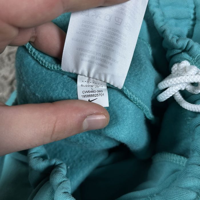 Теплые штаны Nike solo swoosh на флисе