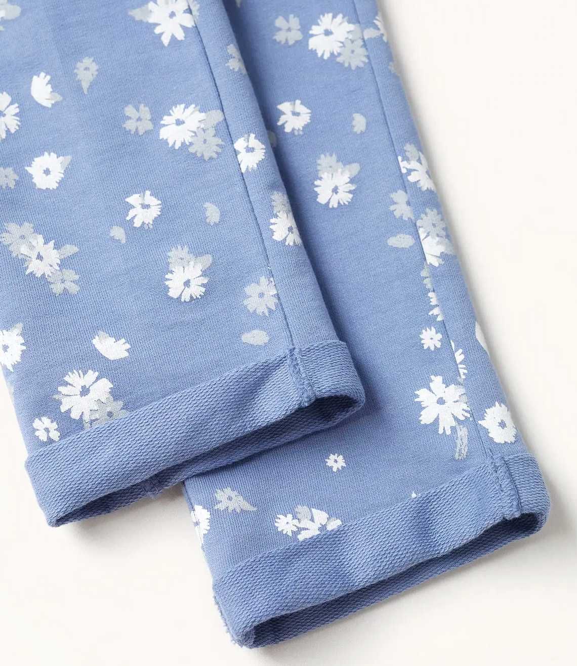 Mango nowe niebieskie spodnie dresowe joggery w kwiatki 11 12 lat 152