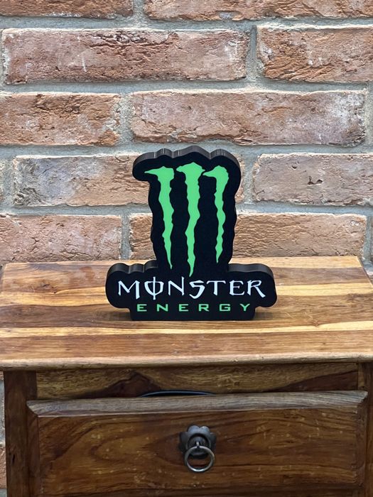 Monster logo stojące