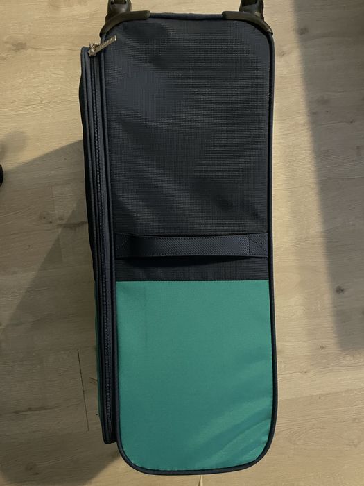 Mala de viagem de marca Pack it com a cor azul/verde a