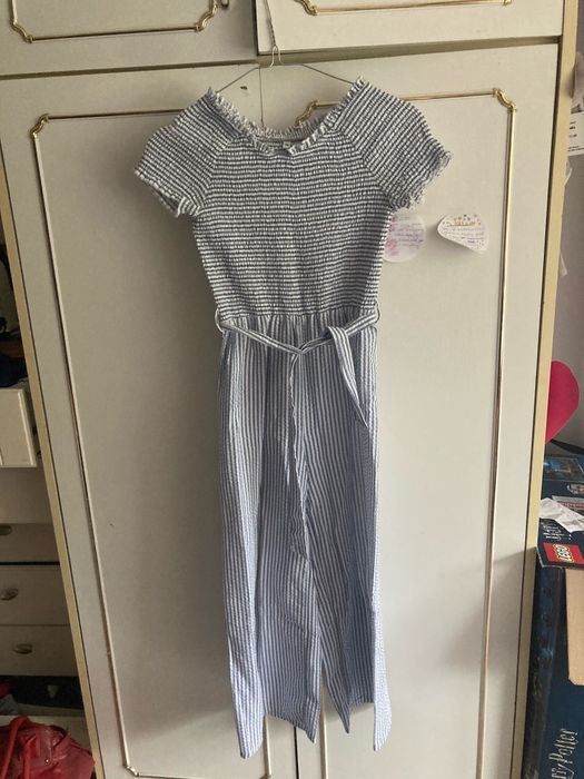 Kombinezon w paski 146 cm