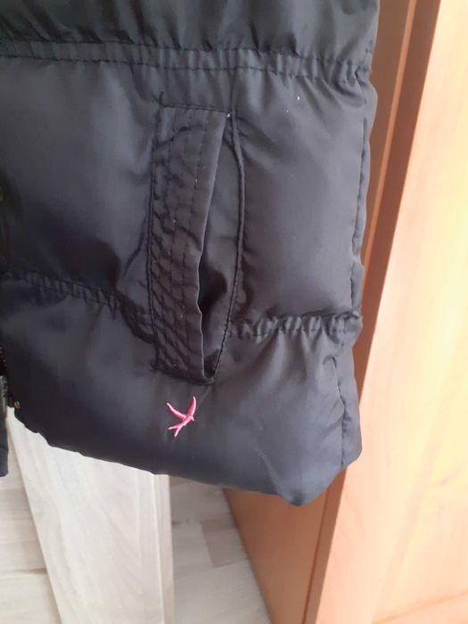 Bezrękawnik dla dziewczynki o rozmiarze 134