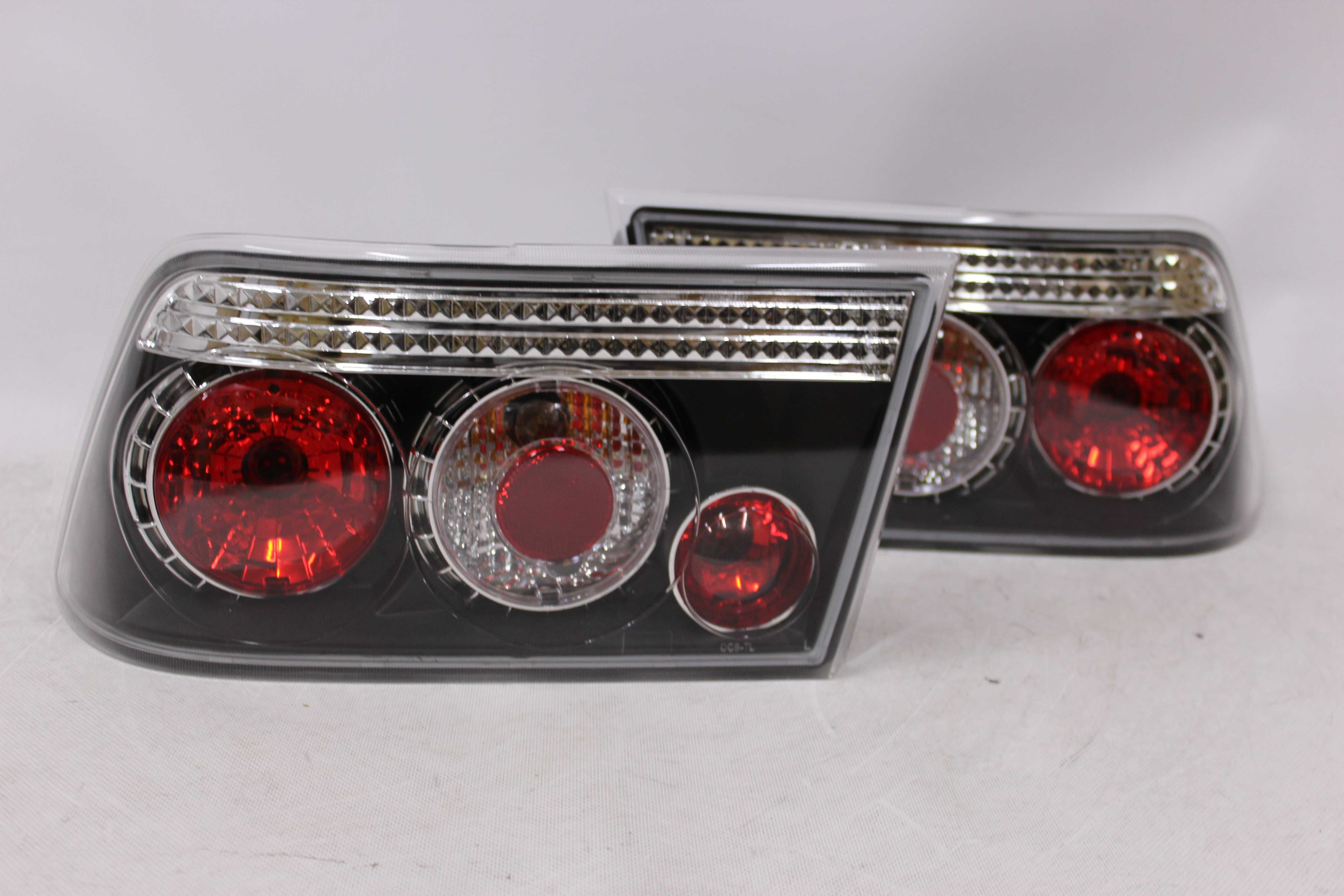 Lampy światła tył tylne OPEL CALIBRA 90-97 BLACK Czarne Smoke NOWE