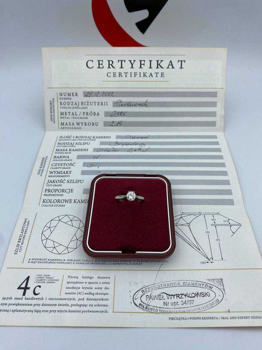Złoty pierścionek z brylantem 0.49ct