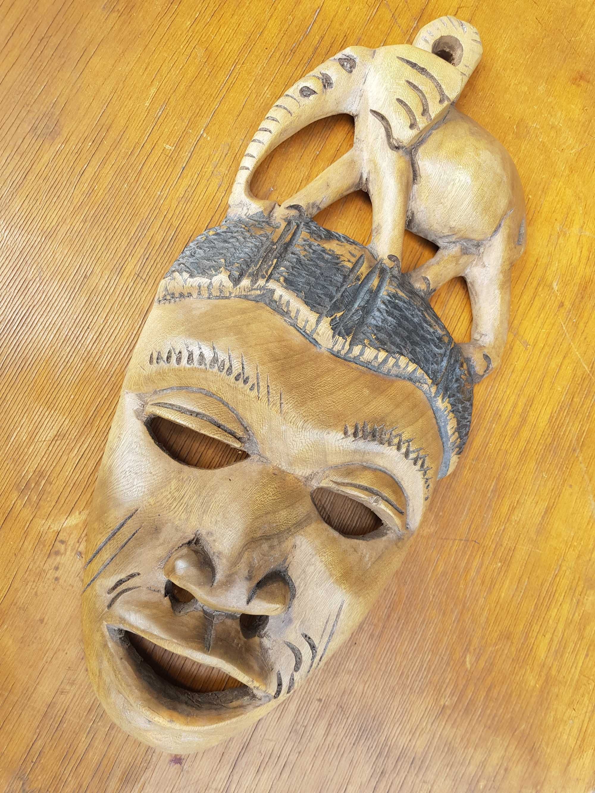 Stara drewniana maska afrykańska człowiek ze słoniem
