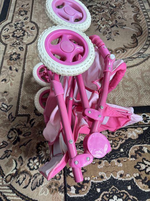 Дитяча коляска іграшкова