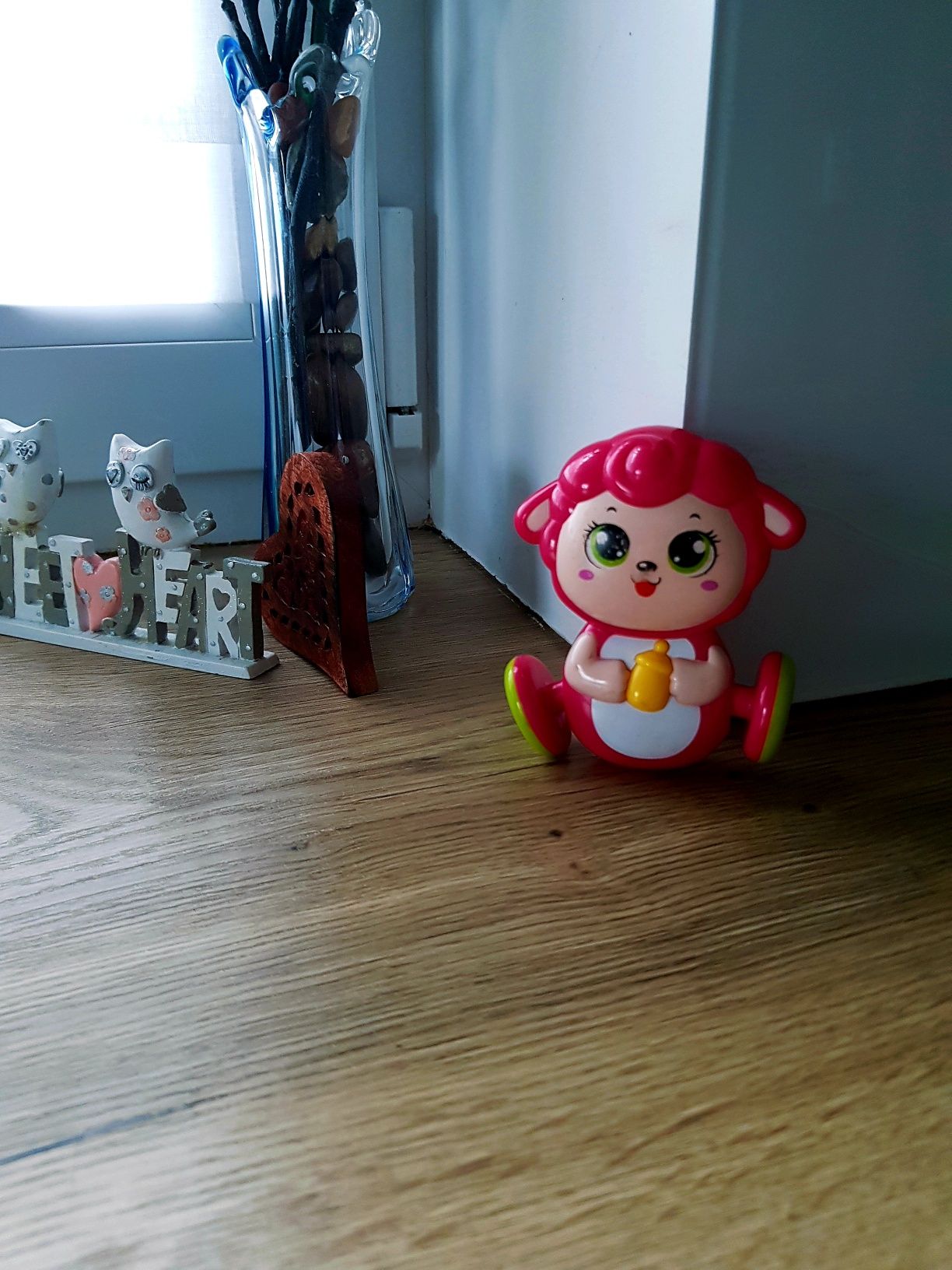 Grzechotka laleczka ruchome nóżki.