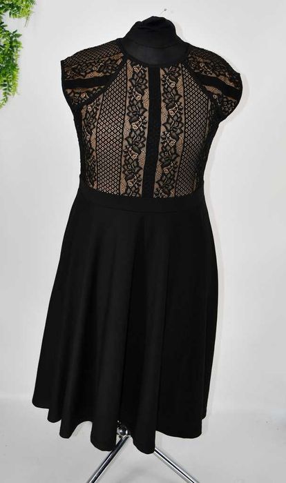 Elegancka sukienka rozkloszowana z koronkową górą Bodyflirt 44/46