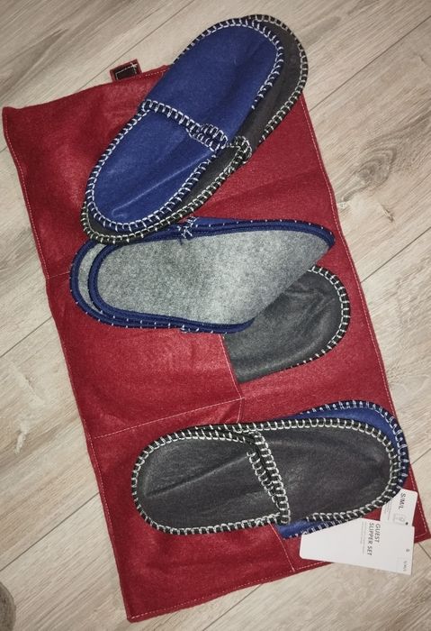 Набор гостевых тапочек в стильном чехле для хранения.