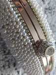 Clutch pérolas e dourada