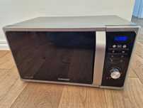 Sprawna kuchenka mikrofalowa Samsung MS23F301TAS srebrna 23l