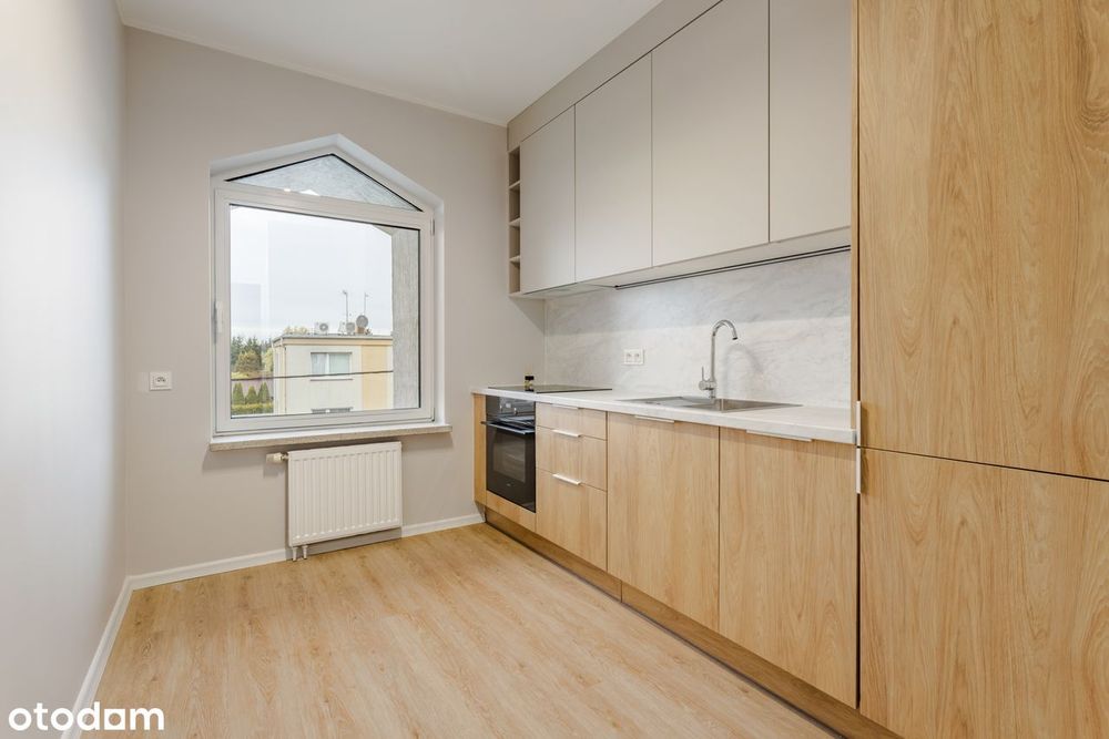 Nowa kawalerka z dużą łazienką, osobną kuchnią i komórką lokatorską