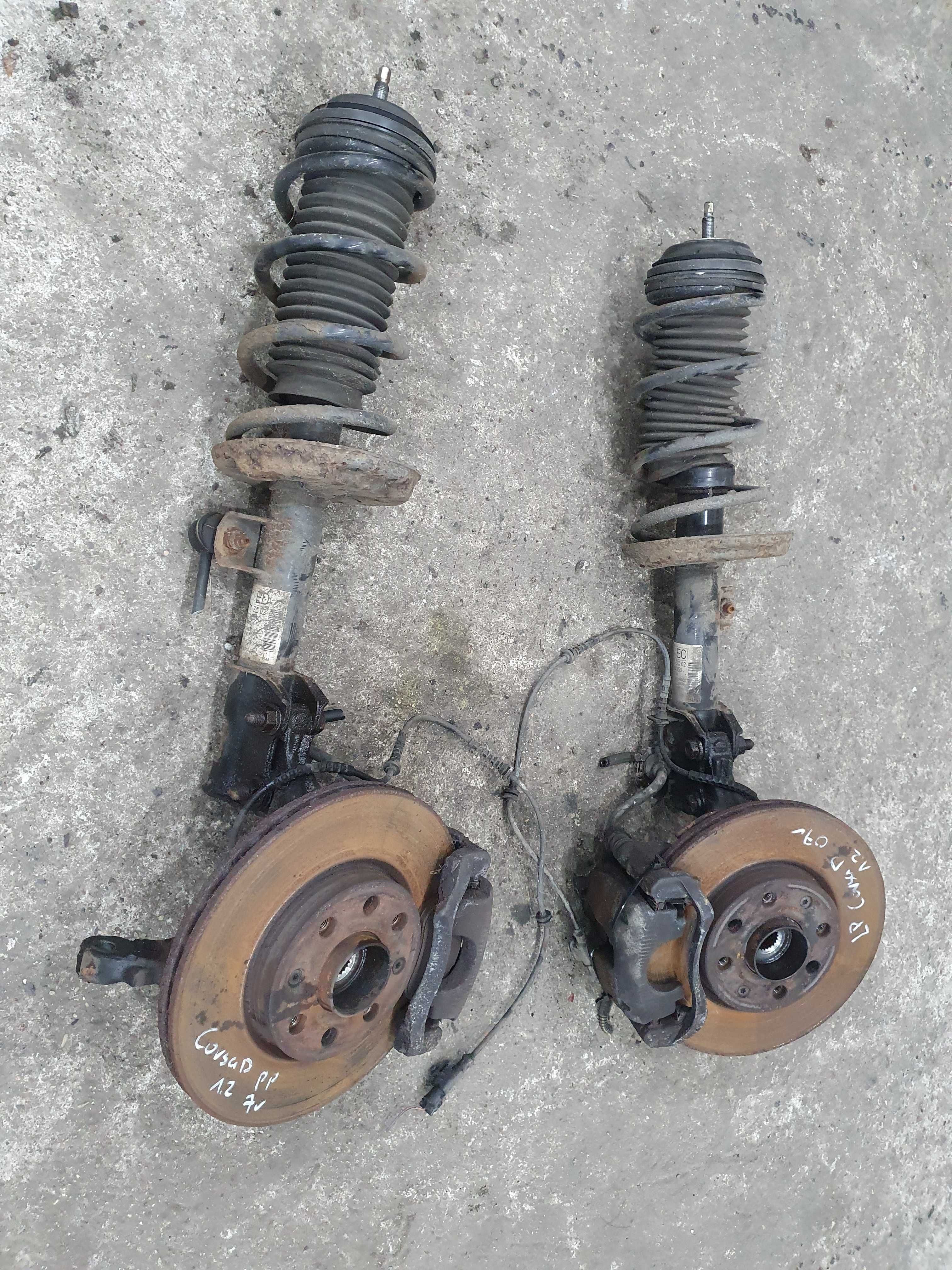 Amortyzator piasta zwrotnica zacisk sprezyna Opel Corsa D 1.2