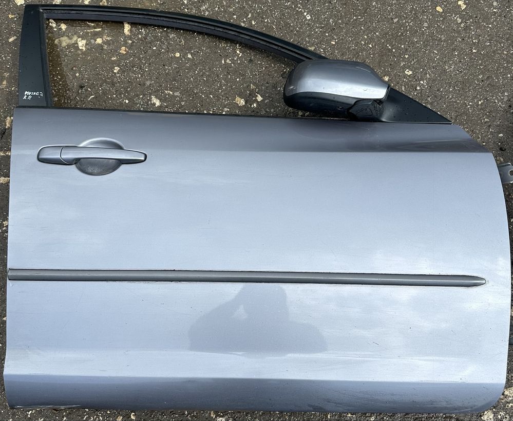 Дверка передня права Mazda 3 bk(ціна за голу дверку)