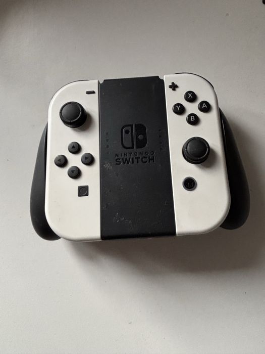 Nintendo Switch OLED + białe Joy-Cony + gry + Nitro Deck