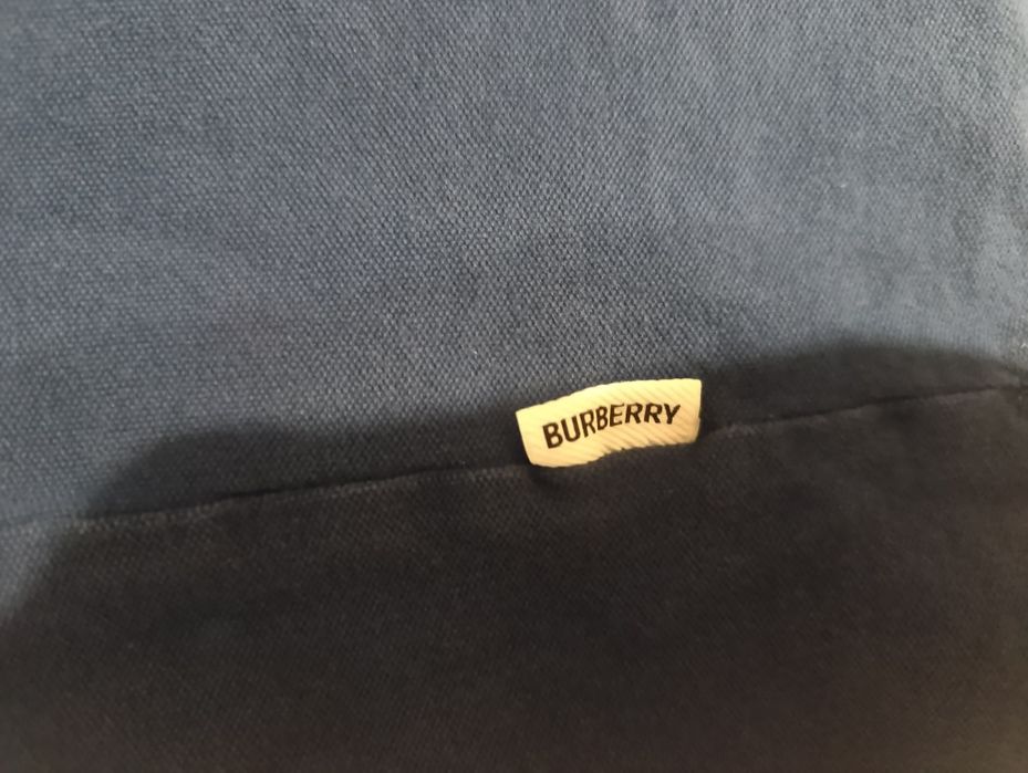 Koszulka Polo Burberry - unikalna wersja na zatrzaski.