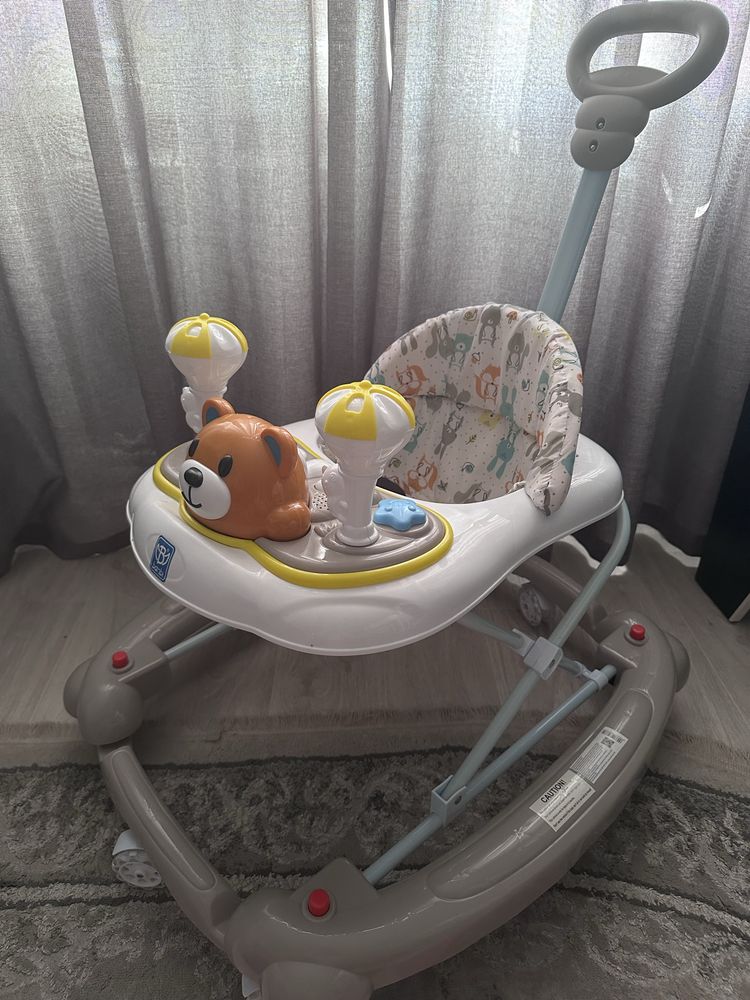 Продам Дитячі ходунки 3 в 1 — музика, іграшки, ручка.