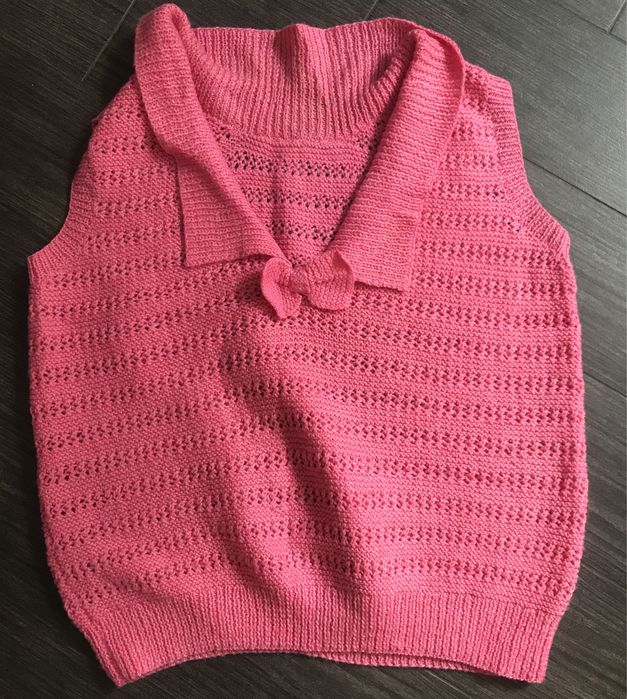 Теплая вязанная жилетка