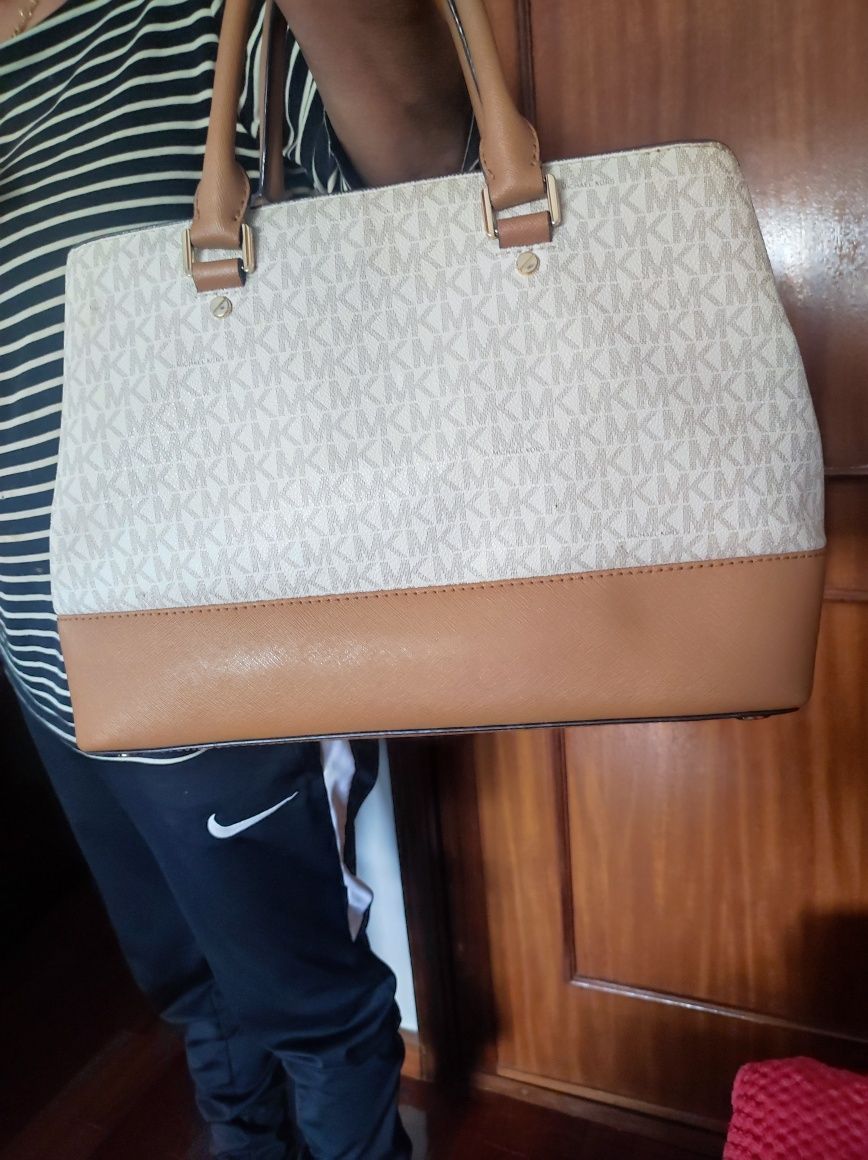 Vendo mala MK como nova