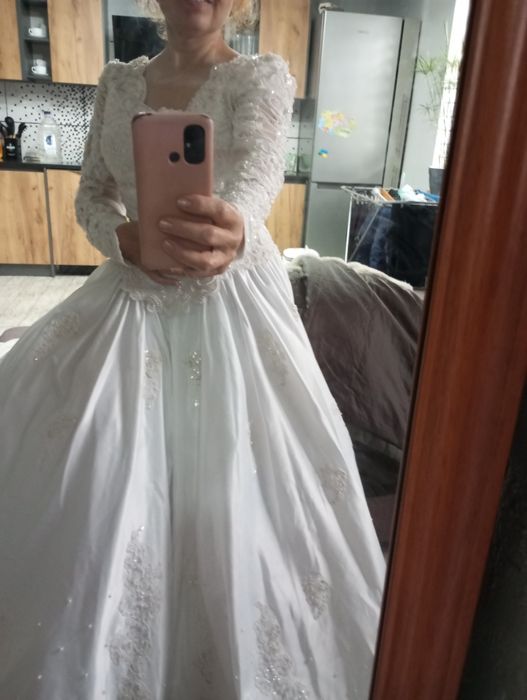 Вінтажна весільна сукня Alfred Angelo.